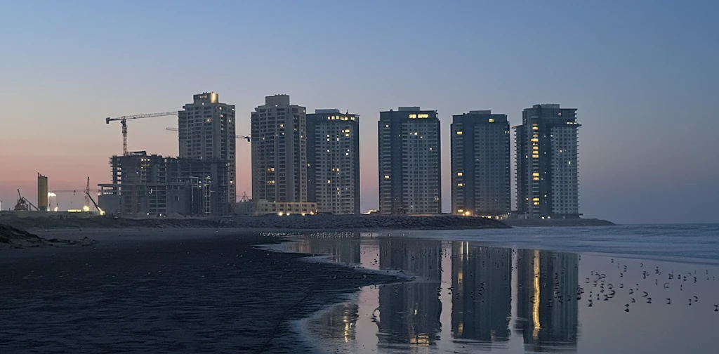Emaar Karachi lost in the magical hues of twilight, where the sky whispers secrets to those who listen